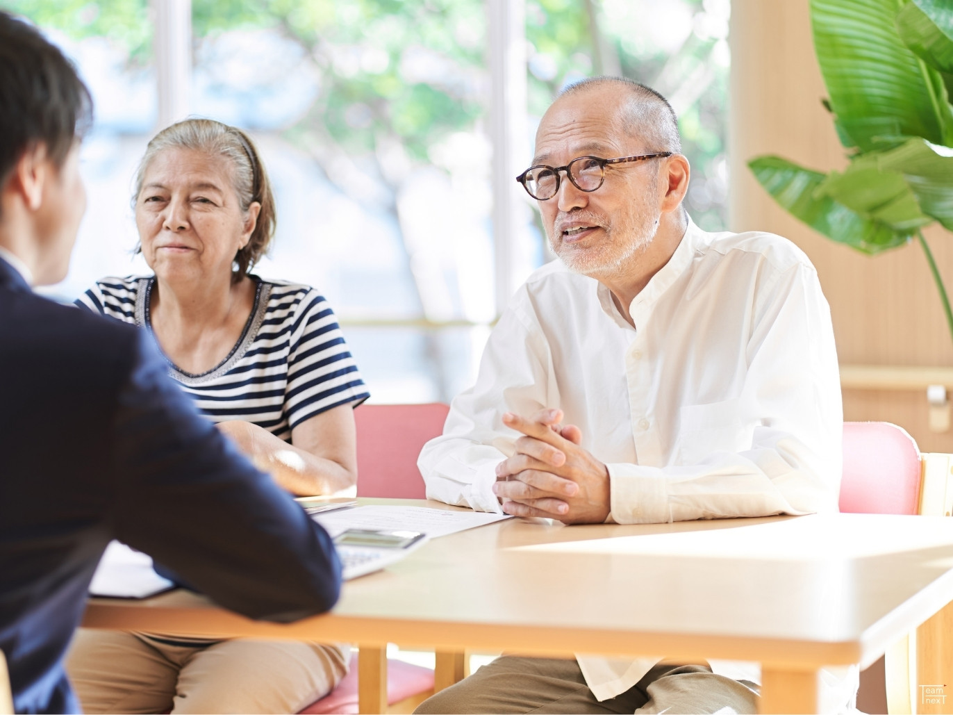 売主ご本人と会話しながら意思能力を見極める神戸都市開発の面談の様子